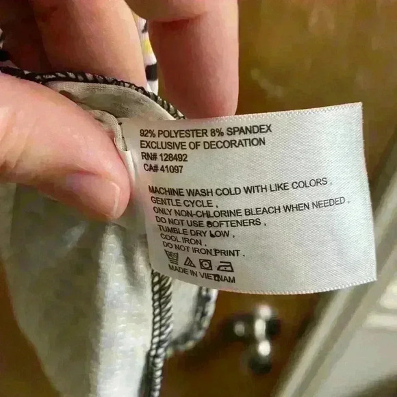 Greg Norman Women’s Golf Shirt XS Black with Patterns Special PGA Patch on Back - Picture 8 of 9